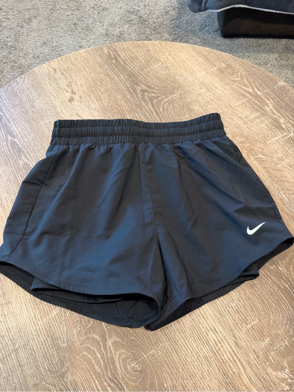 Nike Black Girl’s Athletic Shorts with White Swoosh